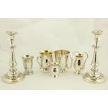 A pair of 19th Century Sheffield silver plated and leaf cast Candlesticks, each with baluster