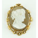 An attractive large carved Cameo Brooch, of a classical lady in gold, oval mount, decorated with
