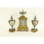 A three piece French gilt brass Mantle Clock Garniture, by Japy Freres, the brass case surmounted by