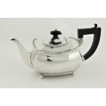 A rectangular ogee shaped silver Teapot, by Atkin Bros., Sheffield c. 1900, with ebonised handle,
