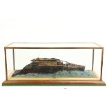 Titanic:  A cased Model of the Wreck of the forward Section as located by Doctor Robert D. Ballard