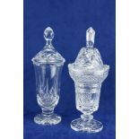 A Waterford crystal Urn and Cover, the domed shaped cover with a spear head finial and strawberry