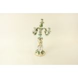 A 19th Century Dresden porcelain flower encrusted Candelabrum, modelled with mother and child