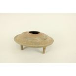 A very early Chinese decorated terracotta disc shaped tripod Bowl or Incense Burner, with two