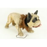 A very good rare French papier mache Barking Bull Dog pull Toy, with flocked coat, glass eyes, the