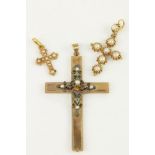 An attractive small cased gold Crucifix, with seed pearls; and two smaller similar ditto. A lot. (3)