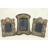 A pair of modern silver Photograph Frames, each with classical cherubs in relief, 20cms x 14cms (