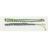 A Sterling silver Ladies Necklace, with green peridot stones inset, approx. 38cms (15") long; a rose