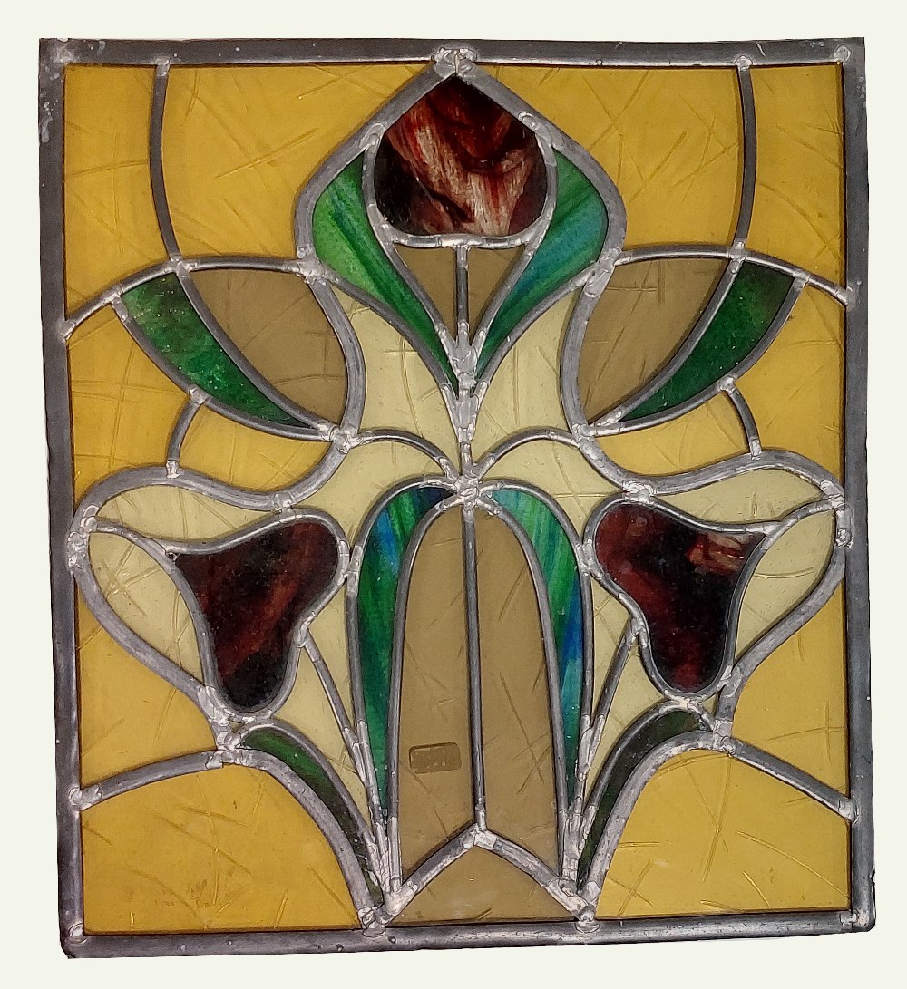 An Art Deco style floral design stain glass Panel, in the style of Rennie Macintosh 18"h x 16 1/2" w