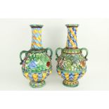 A pair of colourful Italian Majolica two handled Vases, each with half reeded body, 44cms (17"). (2)
