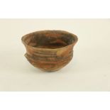 An ancient Chinese XIA Dynasty pottery painted Bowl, c. 2000 BC with flared neck, 13cms x 8cms (5" x