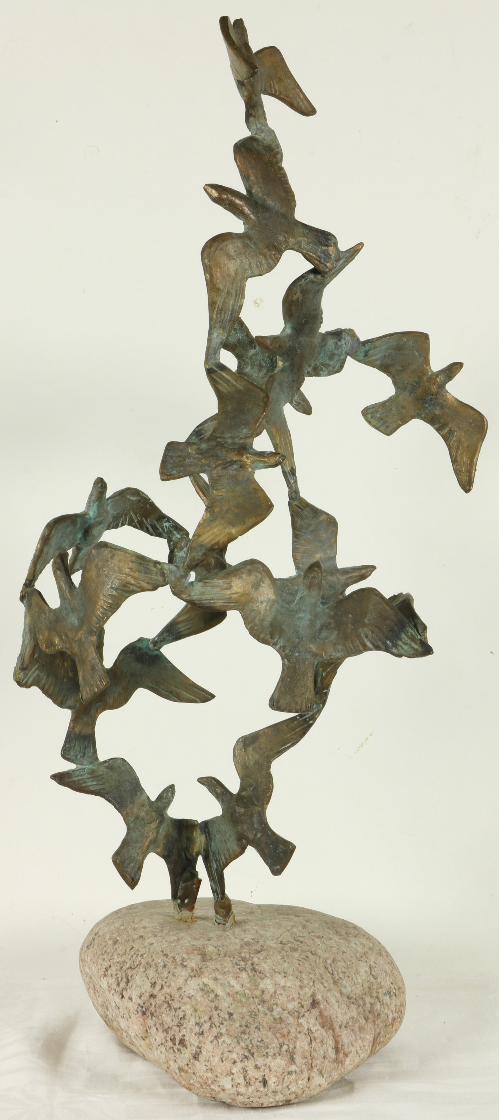 John Behan, Irish, RHA ( b.1938) "Birds in Flight," bronze sculpture, surmounted on natural stone, - Image 3 of 4