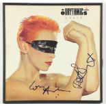 Signed by Annie Lennox & David Stewart Touch, L.P. Record and Cover, signed by both members, photo