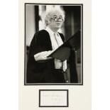 [Heaney (Seamus)] An original black and white Press Photograph of Seamus Heaney standing at a pulpit