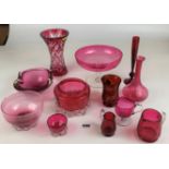 12 assorted pieces of cranberry red glass