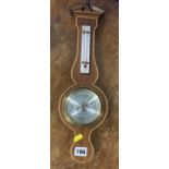 Small inlaid mahogany barometer with thermometer. 18” long.