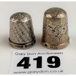 2 embossed silver thimbles, total w: 0.29 ozt