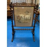 Mahogany carved twist firescreen with tapestry scene of horses and dogs, 30” wide x 46” high.