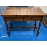 Mahogany Turnover top table with green baize interior and 2 drawers on castors. 39” long x 32”