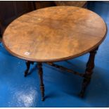 Walnut dropleaf table on castors. 35” wide x 29” high x 7” closed 42” open.