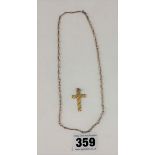 9k gold cross pendant and unmarked chain. Cross 1”, chain 15”, Total W: 1.1g