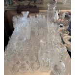 Cut glassware inc. 4 decanters, 14 assorted brandy glasses, 6 assorted champagne flutes, 6 wine