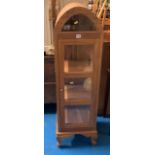 Dome top display cabinet with opening centre door and glass sides. 14” wide x 14” deep x 49” high.