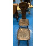 Carved punishment chair and matching stool. 14” x 13” x 36” high. Stool- 13” sq x 14” high.