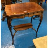 Shaped mahogany turnover top card table. 23” x 15” closed. 29” x 22.5” open x 28” high.