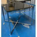 Square black glass and steel occasional table. 19.5” square and 18” high.