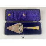 Silver commemorative trowel with bone handle inscribed ‘Presented to the Right Reverend The Lord