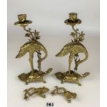 Pair of brass peacock candlesticks 11” high and pair of brass frogs 4” long