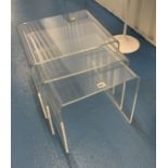 Nest of 3 acrylic tables. Largest 18” long x 15.5” wide x 16” high.