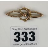 9k gold infinity moon brooch. 1.52” long, W: 1.2 g