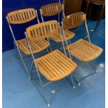4 wood and chrome retro folding chairs. 17” wide x 16” deep x 32” high.