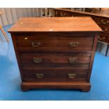 Oak chest of drawers with brass handles. 3 long drawers. Marked on top. 36” long x 20” wide x 34”