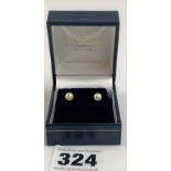 Boxed 9K gold pair of pearl earrings.