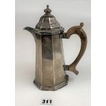 Silver coffee pot with wooden handle, 8.5” high. W: 17.5 ozt