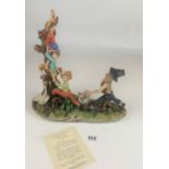 Capo di Monte figure by Mariani ‘Scrumpy’, 14” long x 15” high. With certificate. End of stick