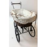 Dolls’ wicker pram with lining and hood Handle height 24”, length 21”