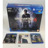 Boxed Sony PS4 500Gb Jet black ‘Uncharted 4 A Thiefs End’ console and 3 PS4 Games- Hitman, Call of