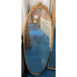 Oval gilt framed mirror 44.5”h x 15”w