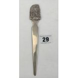 Silver letter opener with Egyptian design top, 7” long. W: 1 ozt