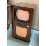 Old Ekco television in cabinet on castors, 17”l x 16” w x 32”h