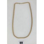 9k gold necklace 20” long, w: 6.7 gms