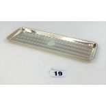 Silver tray 9” long x 3” wide. W: 3.4 ozt