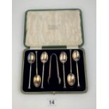 Cased set of 6 silver coffee spoons and sugar tongs, total w: 2.3 ozt