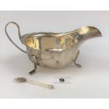 Silver gravy boat with tiny silver spoon 6” long, w: 3.4 ozt