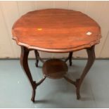 Mahogany round shaped window table with shelf, 27” diameter x 29” high