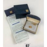 10k gold tiepin with Royal Recognition emblem with box and certificate of authenticity, w: 4.7 gms